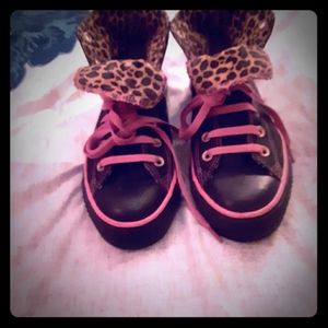 Black and Pink Converse high tops